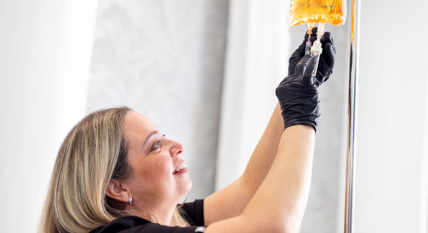 Cold And Flu IV technician preparing an iv bag