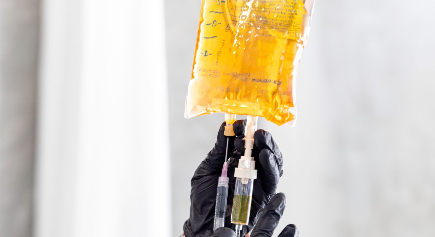 IV Therapy bag being prepped for treatment