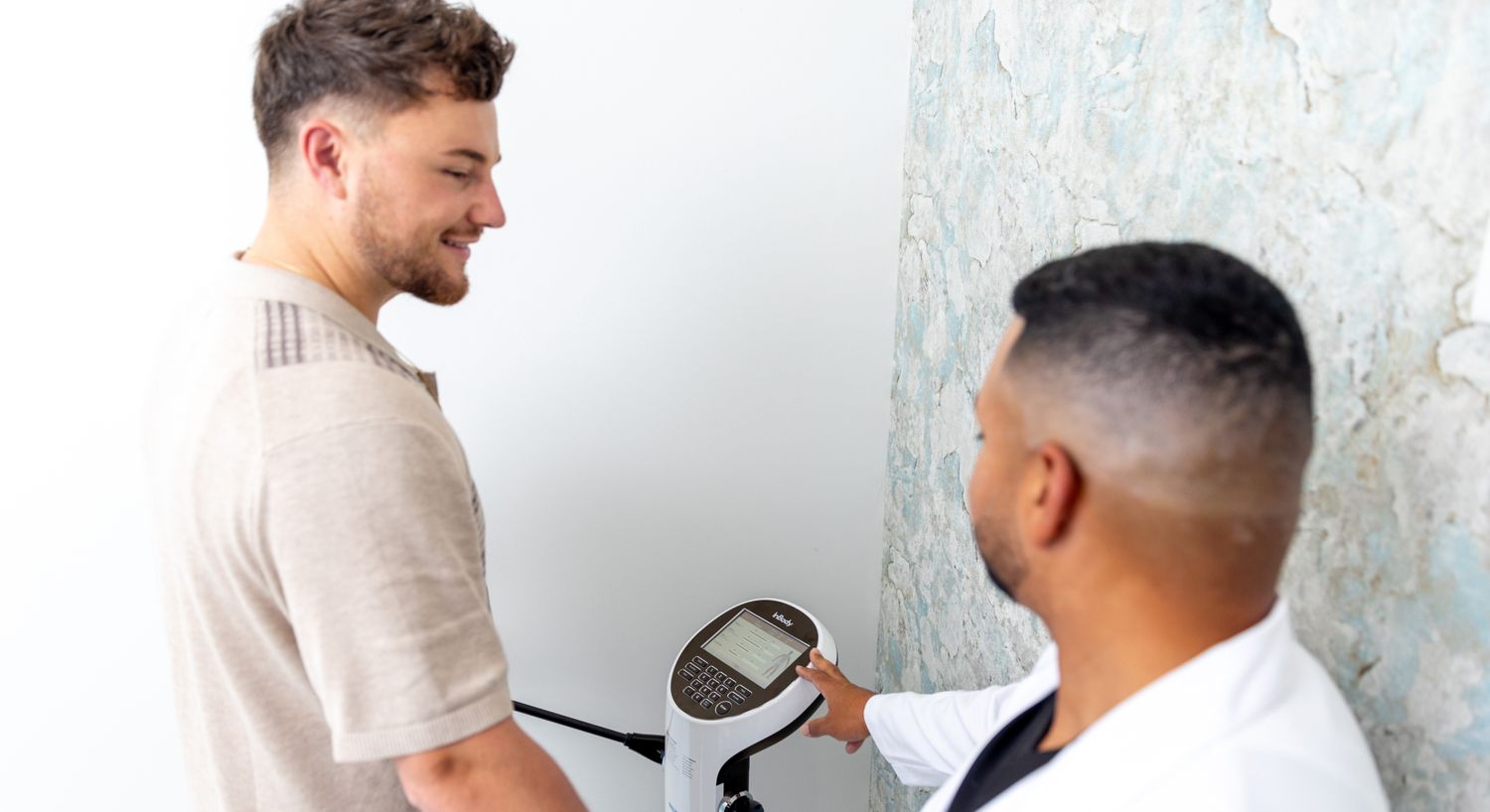 Medical Weight Loss patient model getting weighed on a scale