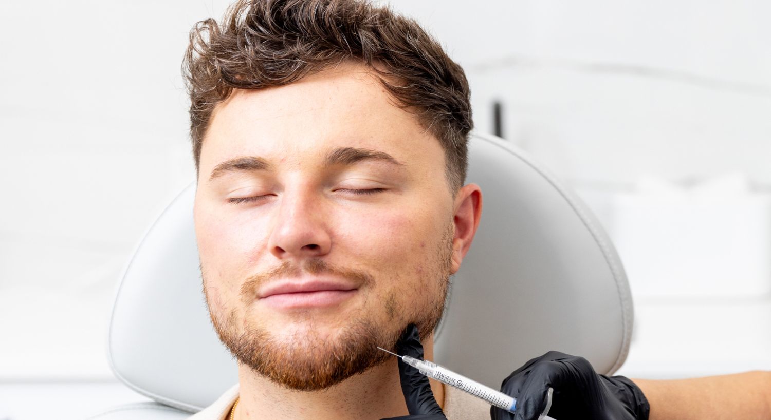 Rha Filler patient model receiving treatment in a med spa